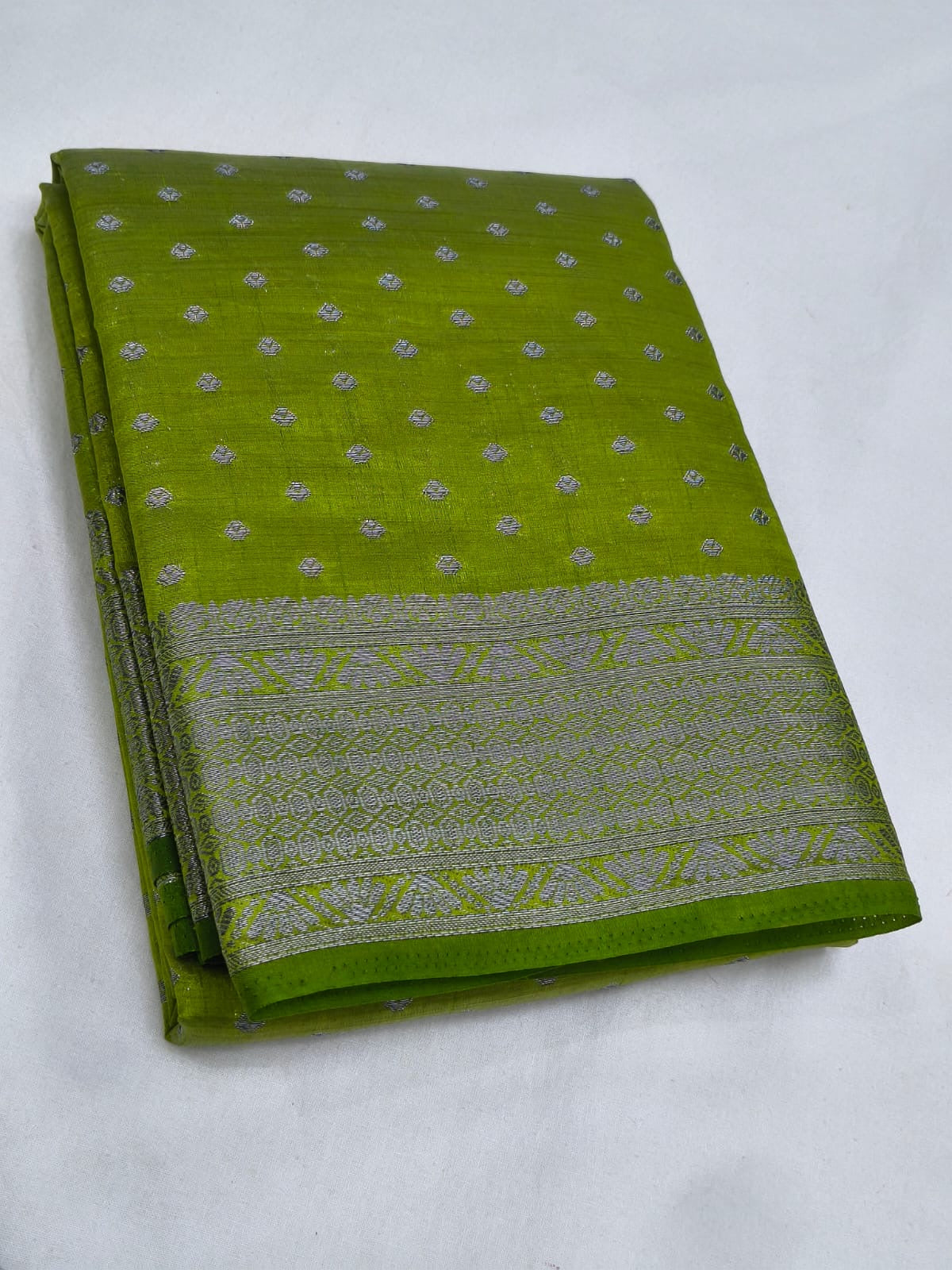 Sea Green Semi Tussar Silk Saree with Silver Zari Buttas