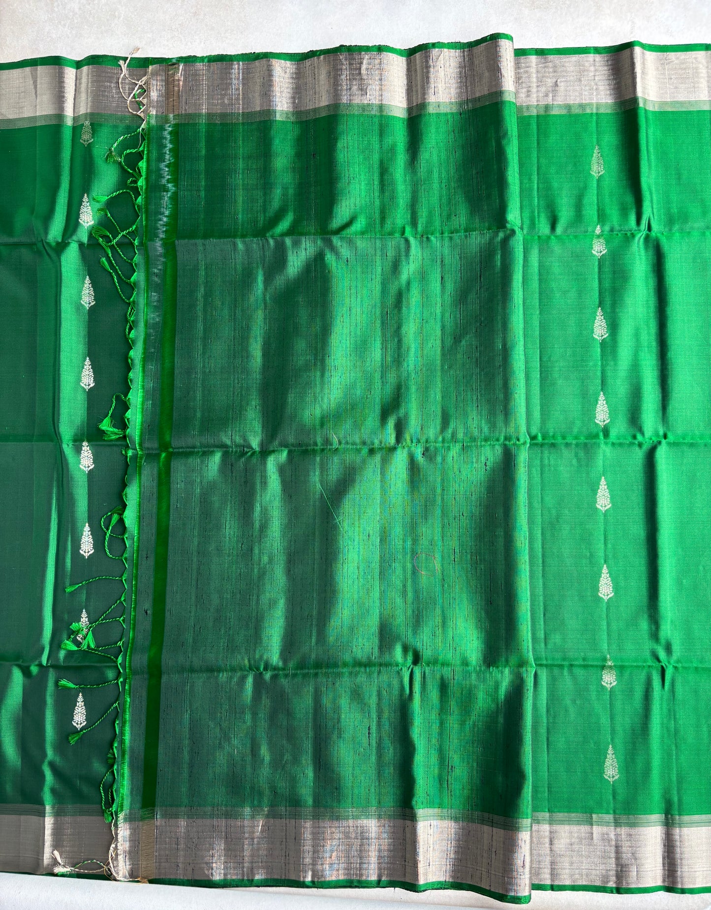 Emerald Green Silk Saree with Floral Buttas and Grand Zari Pallu