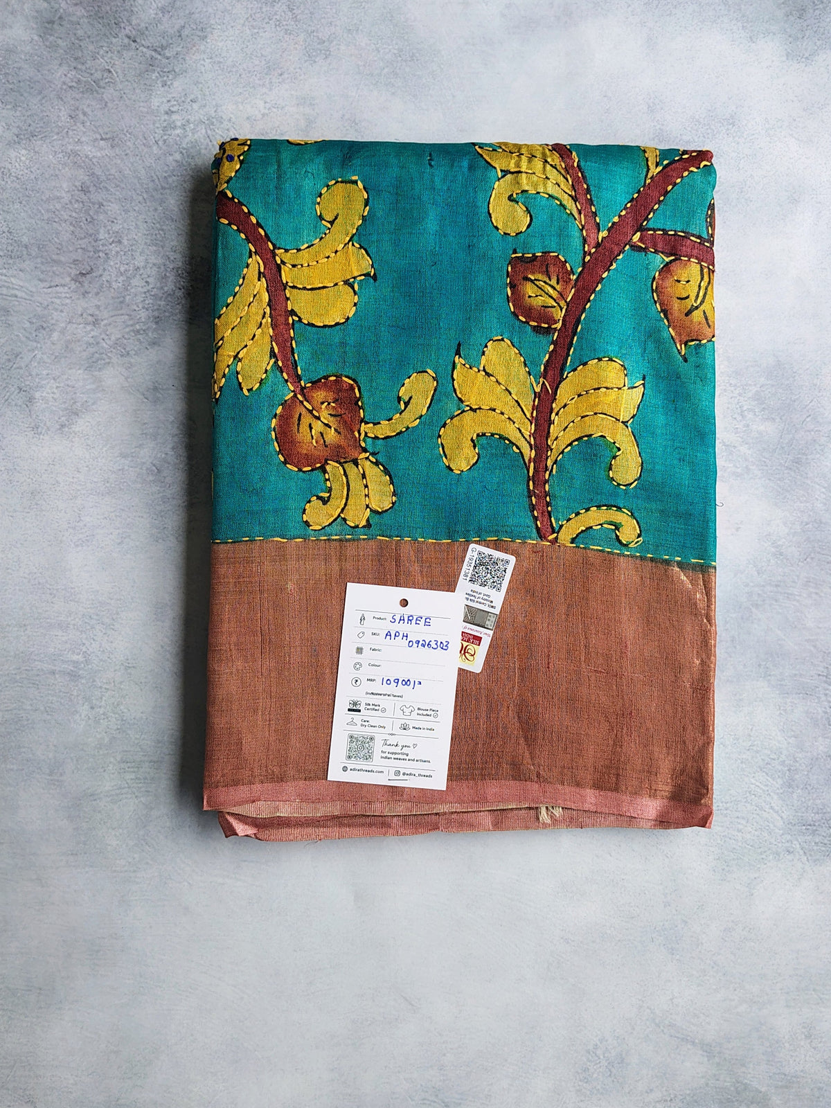 Teal Blue Kalamkari Tussar Silk Saree with Copper Border