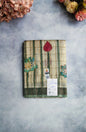 Cream Lotus Check Kalamkari Tussar Silk Saree with Green Border