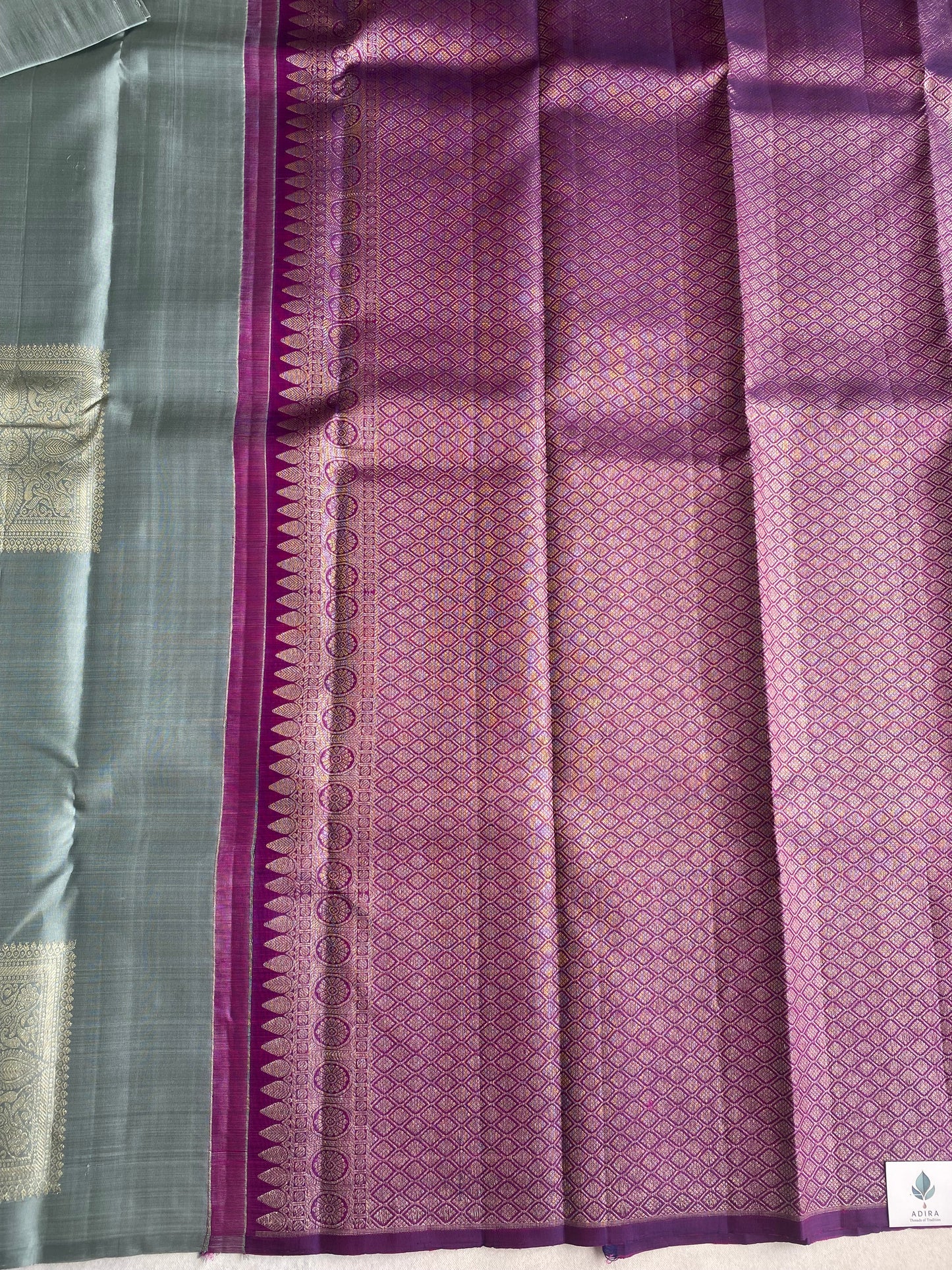 Sage Green Handwoven Silk Saree with Intricate Heritage Woven Panel
