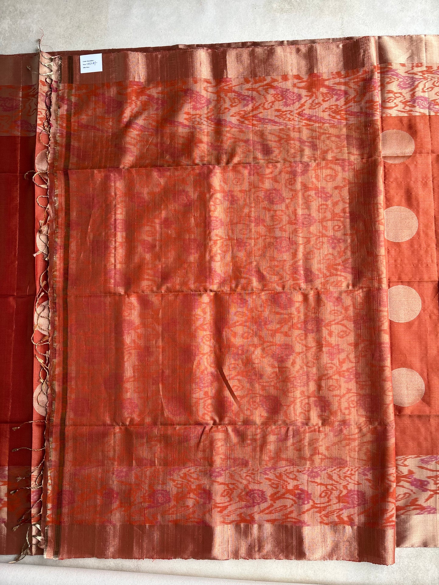 Rust Orange Silk Saree with Ikat-Inspired Weave and Statement Polka Motif