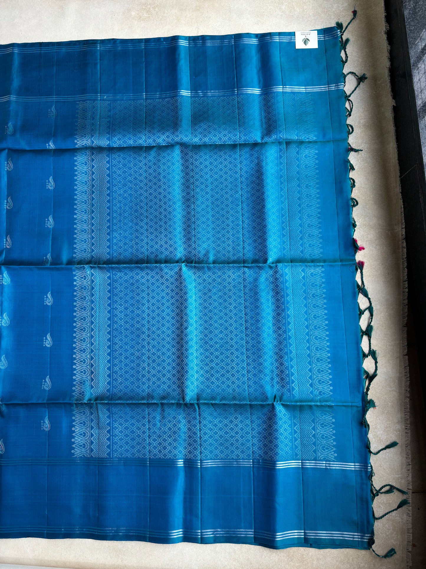 Turquoise Blue Silk Saree with Paisley Motifs