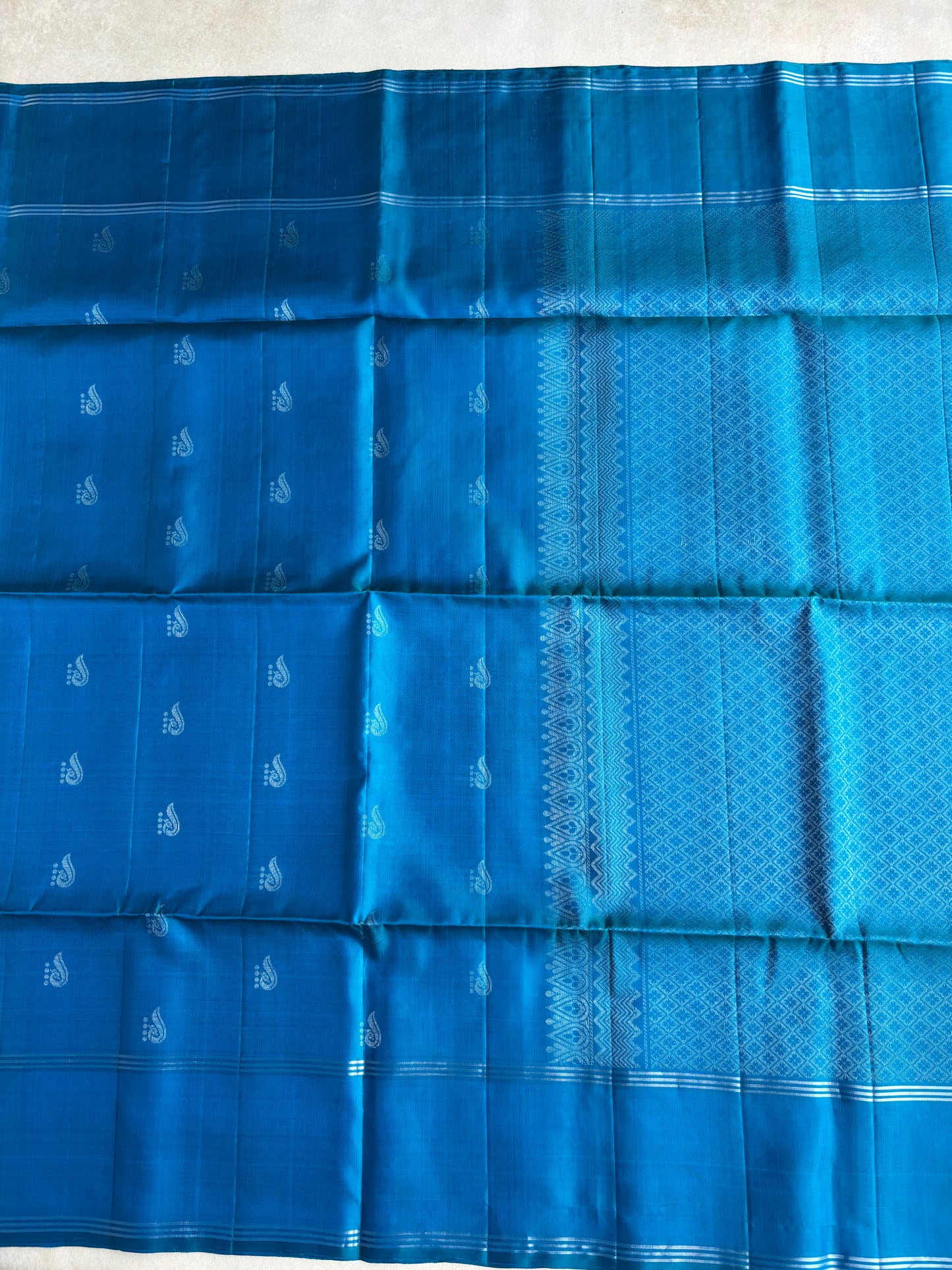 Turquoise Blue Silk Saree with Paisley Motifs